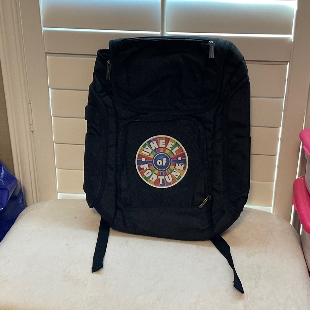 Men's Black Backpack with Colorful Wheel Design